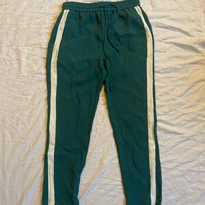 Green Track Pants with White Stripes